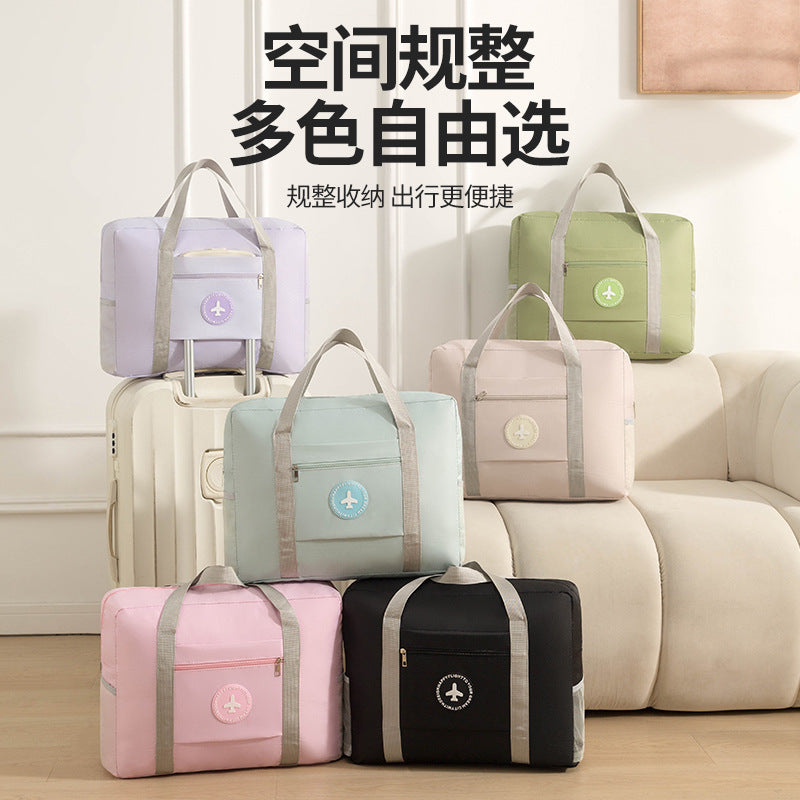 Travel storage bag with round logo, airplane bag, clothing storage bag, multifunctional large-capacity foldable waterproof luggage storage bag - image 1