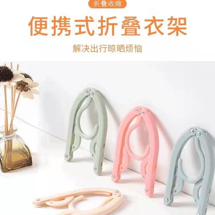 Multifunctional Magic Travel folding clothes hanger portable retractable travel business trip home clothes hanger factory direct supply - image 1